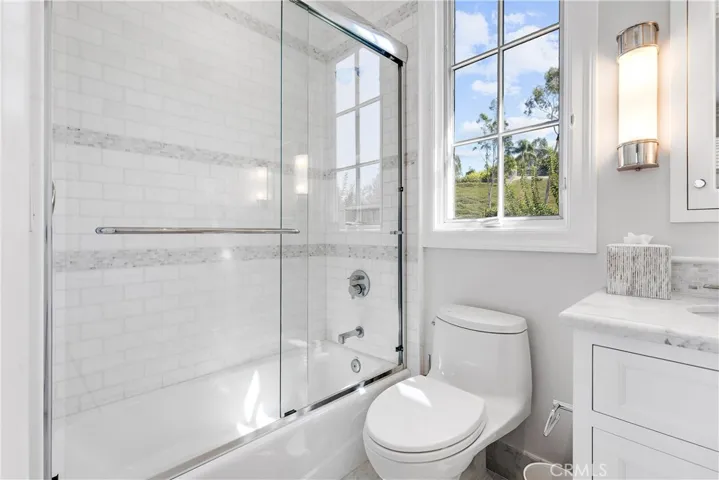 En-suite bathroom for Bedroom #2.  Marble floors have radiant heat.