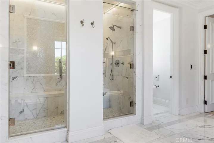 Dual unit mister steam in master shower.  Toto automated toilet.