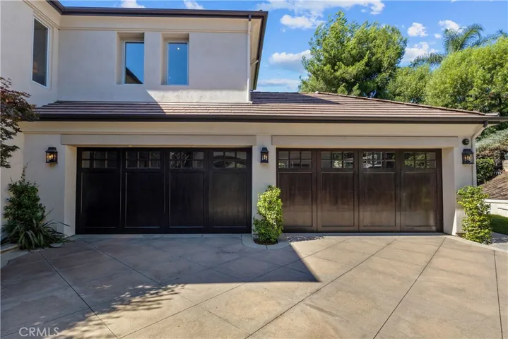 Custom garage doors. 4 cars.