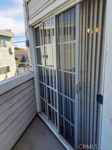 GLASS DOOR DIRECTING TO COMMON AREA ON SECOND FLOOR