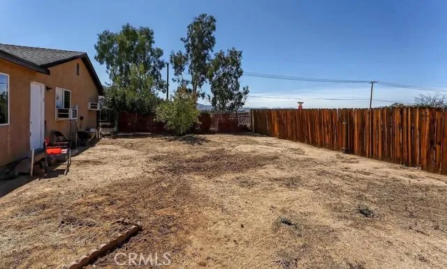 Studio's private enclosed yard with separate entrance