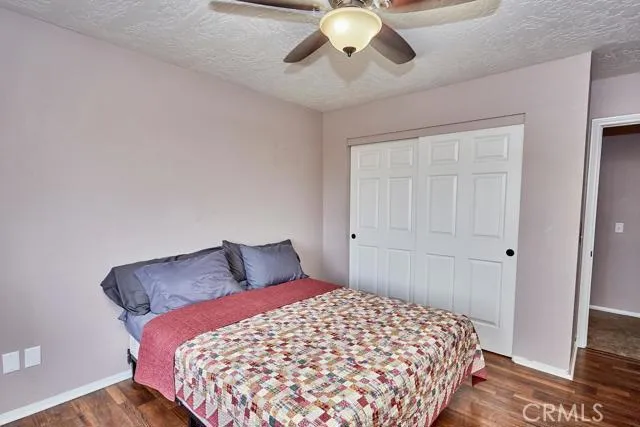 All bedrooms are oversized and feature lighted ceiling fans and upgraded flooring. The two hall bedrooms also feature seated bay window nooks.