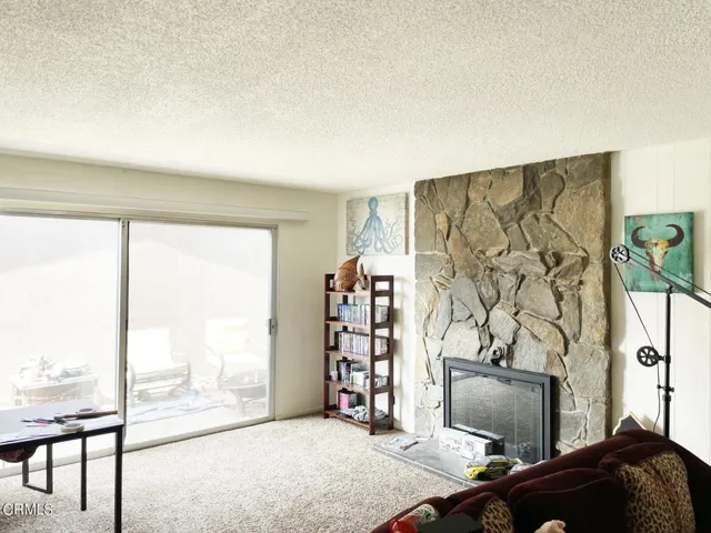 Rear Unit Living room and fireplace