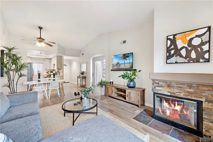 Cozy fireplace with TV hookup above.