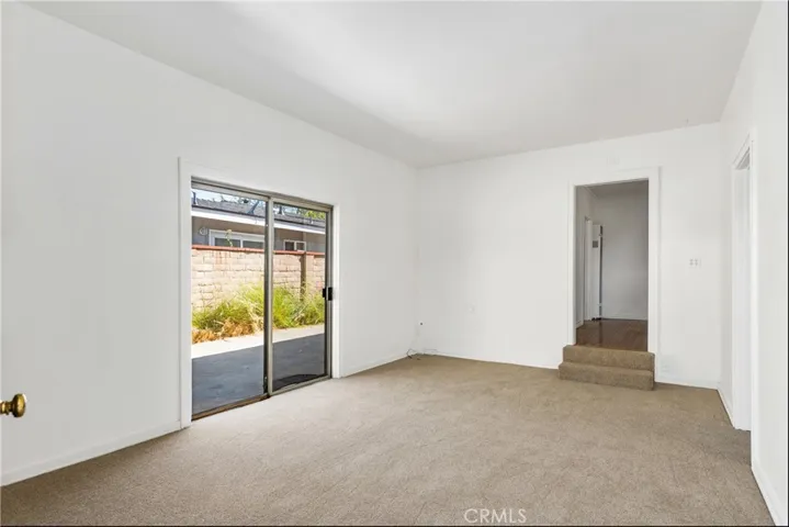 STEP DOWN INTO FAMILY ROOM