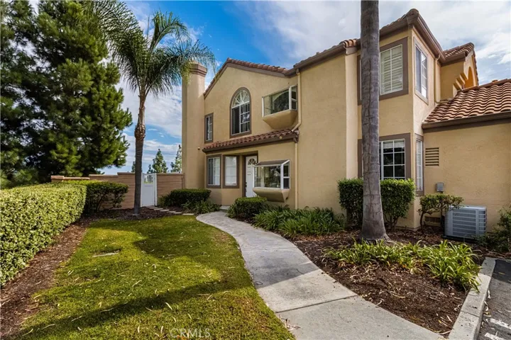 End unit with very private front door/entrance and yard entrance
