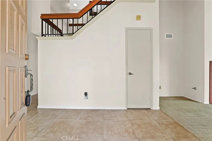 Spacious entry with coat closet