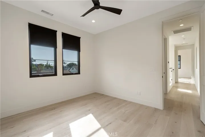 This shows the upstairs bedroom empty.