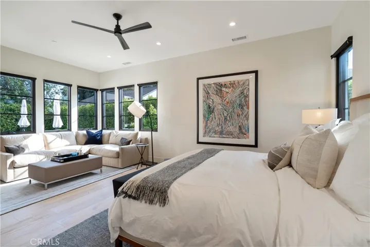 The second master suite looks out to the private backyard.