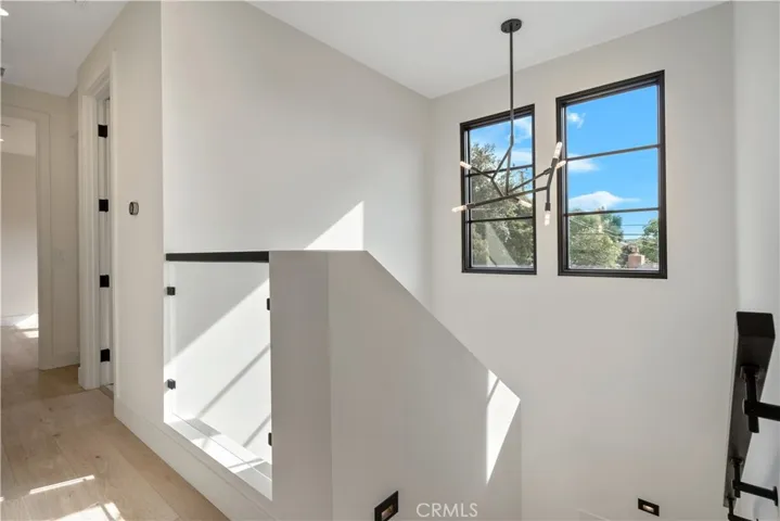 Upstairs windows bring in ample light.
