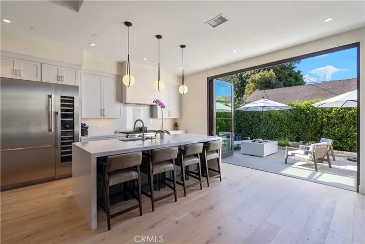 This stylish kitchen with a large island is a great space to entertain.