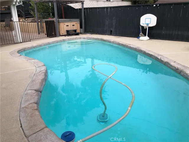 Pool and free standing spa
