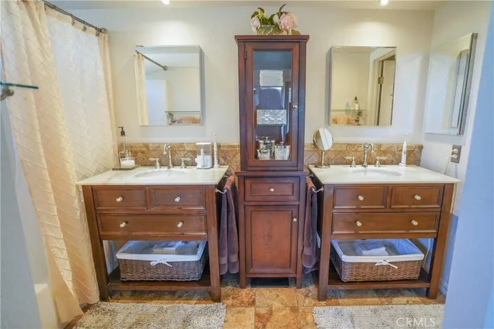Two vanity's in master bedroom.