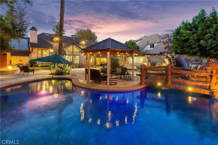 Sunset of Lagoon Pool with waterslide