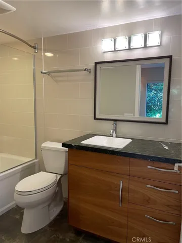 Upgraded bathroom in the second room.
