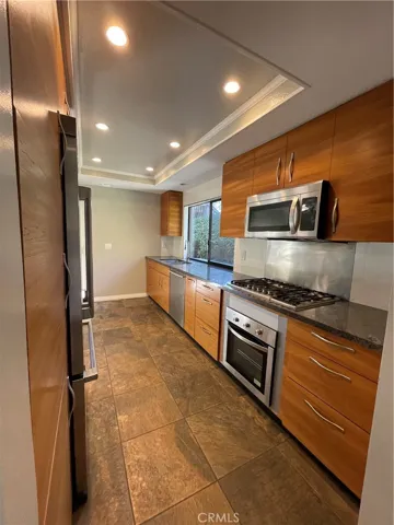 Kitchen has been tastefully painted and upgraded.