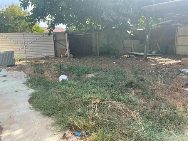 Fenced In back yard of Property1