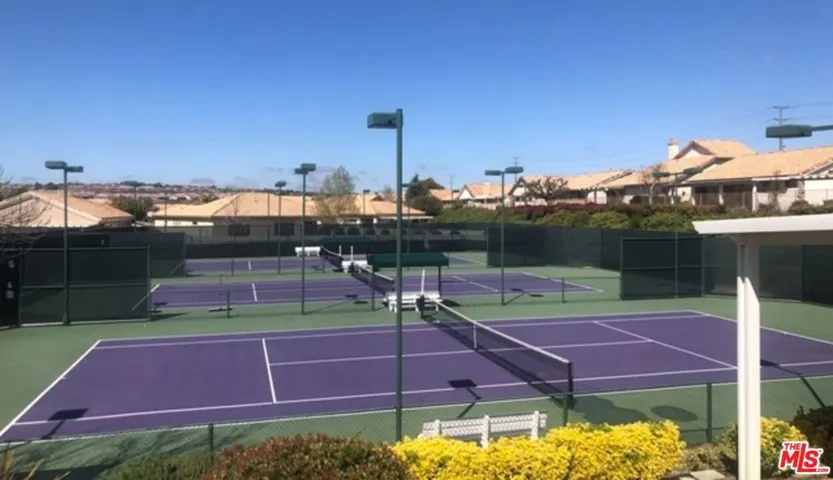 Regulation lighted tennis courts.