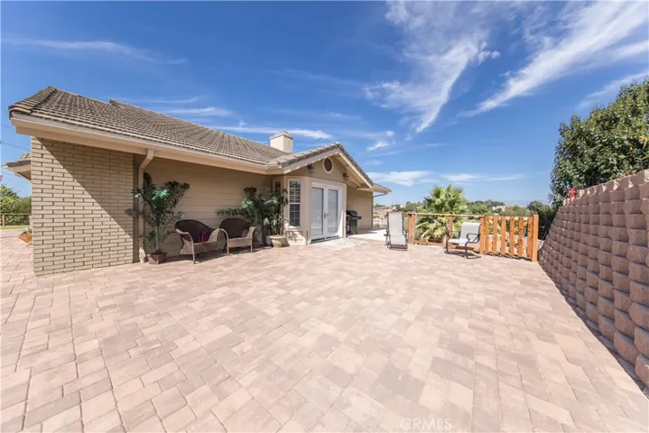 Beautiful side patio off Dining room with pavers