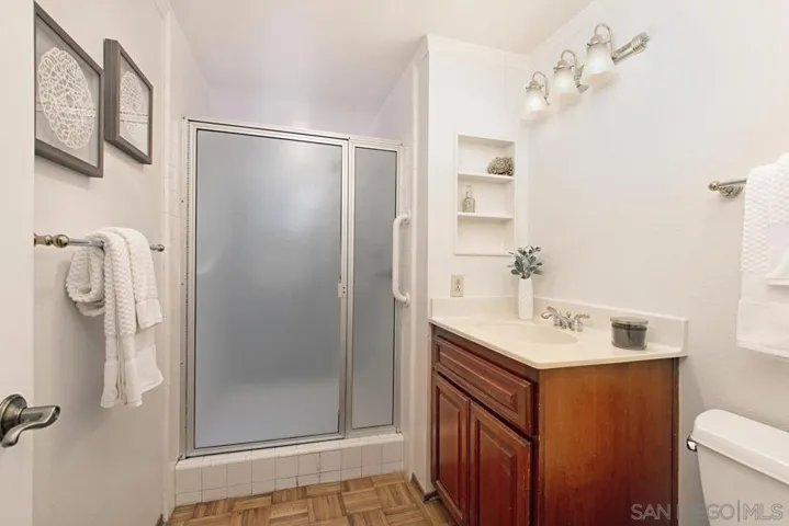 Downstairs 3/4 bath, with access to the side yard