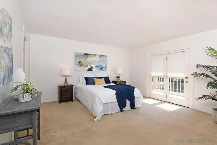 French doors out to the private balcony.