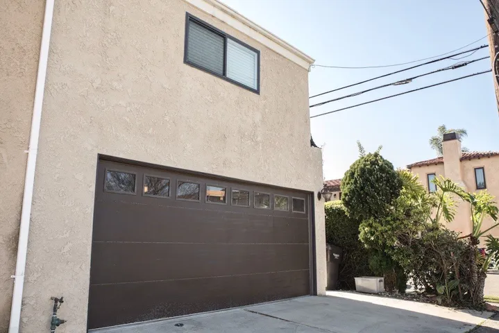 Garage with parking behind.