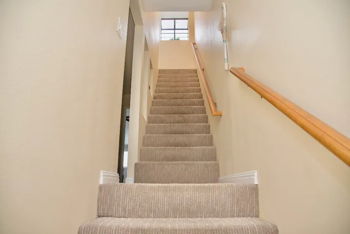 Stairway to rooftop deck.