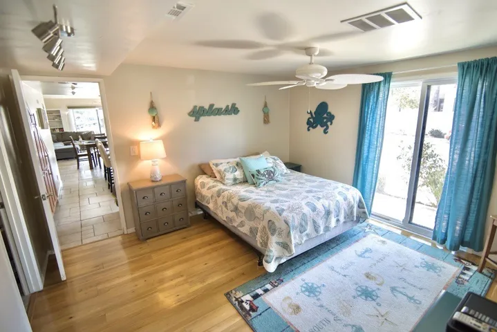 Main level bedroom off of the kitchen.
