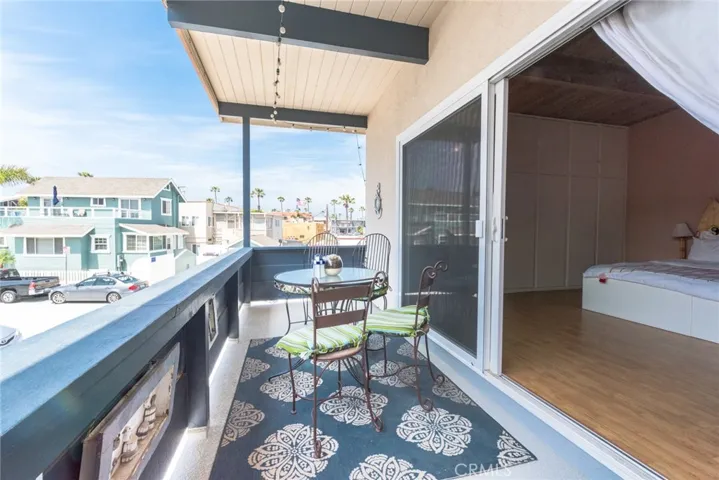 UPSTAIRS UNIT FIRST BEDROOM BALCONY