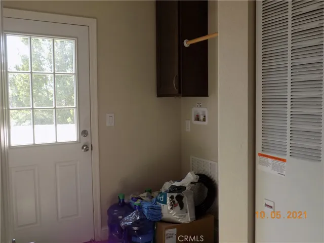Laundry room and back door to backyard