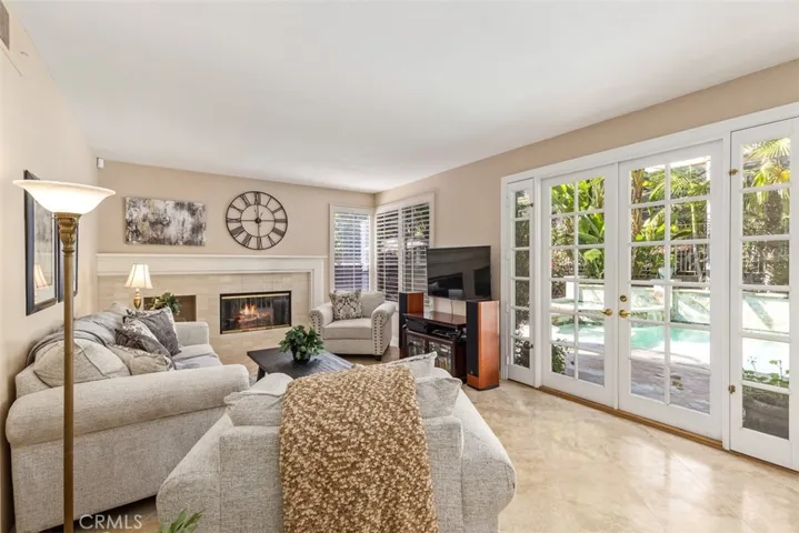 Family room french doors lead to amazing outdoor living