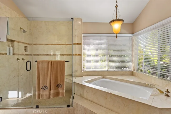 Beautiful garden style soaking tub and large walk in shower