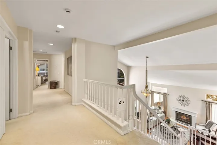 Upper hallway looking down to the living room