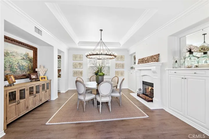 Dining room with dual sided fireplace to living room