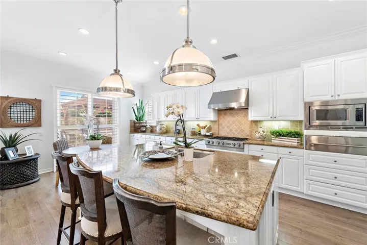 Well designed kitchen for cooking and gathering