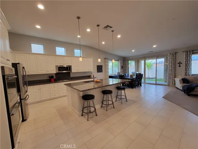 Kitchen: Large OXXO Sliding glass door.