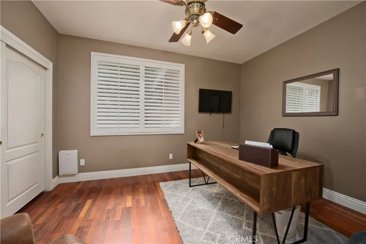 Downstairs bedroom with a doggy door to the sideyard