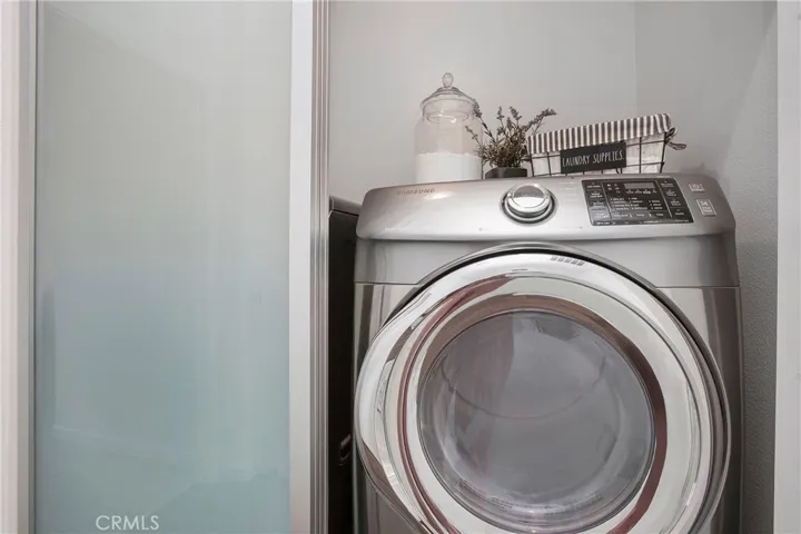 New washer and dryer with custom frosted glass doors