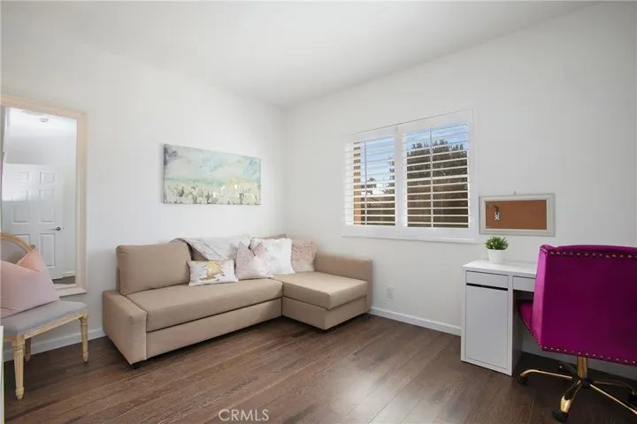 Second master with huge walk in closet, shutters and wood floor.