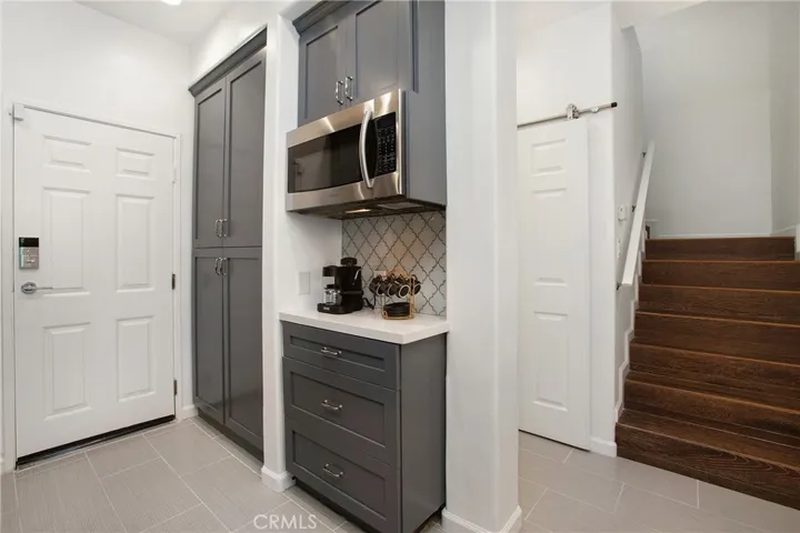 Coffee bar area, plenty of pantry storage and direct access to garage