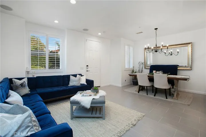 Tall ceilings and doors, recessed lighting and shutters looking out to private yard