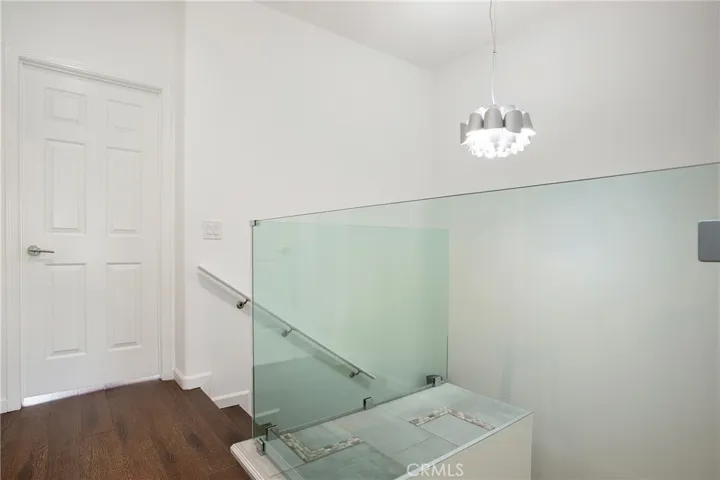 Contemporary glass and lighting add to the open feel