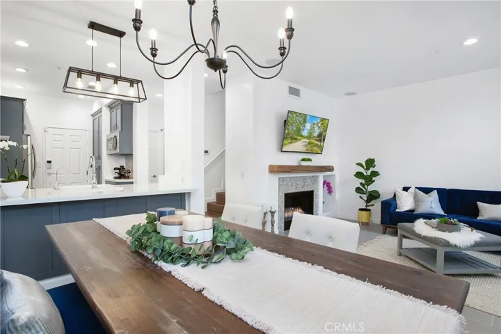Kitchen breakfast bar opens to dining room