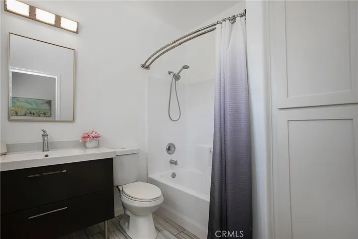 Master bath with new vanity, tub/shower and shaker style linen