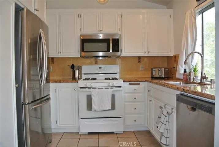 Kitchen with stainless steel appliances