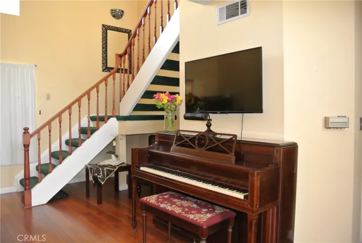 Living room and stair case to the loft
