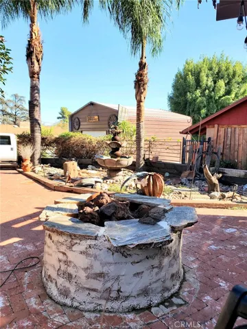 Fire Pit next to pergola