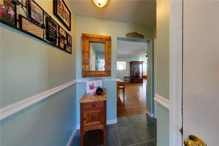 Hallway going towards kitchen and family room.
