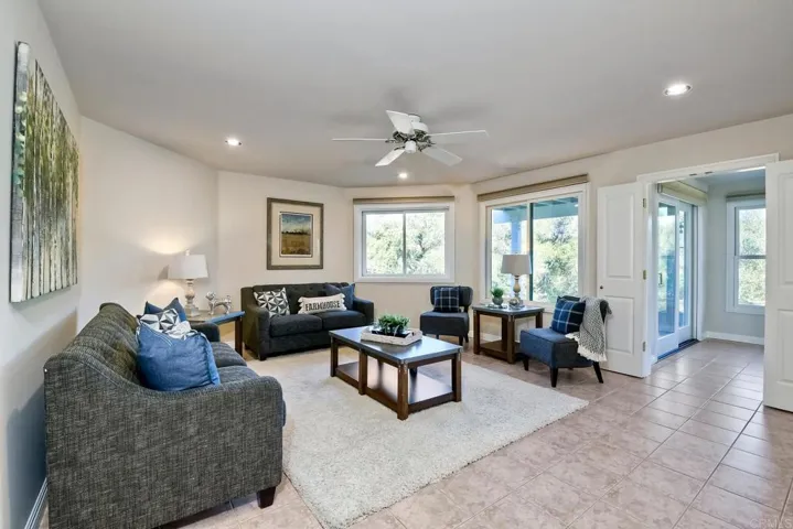 This family room is located downstairs. Exercise room and a bedroom are also on this level.