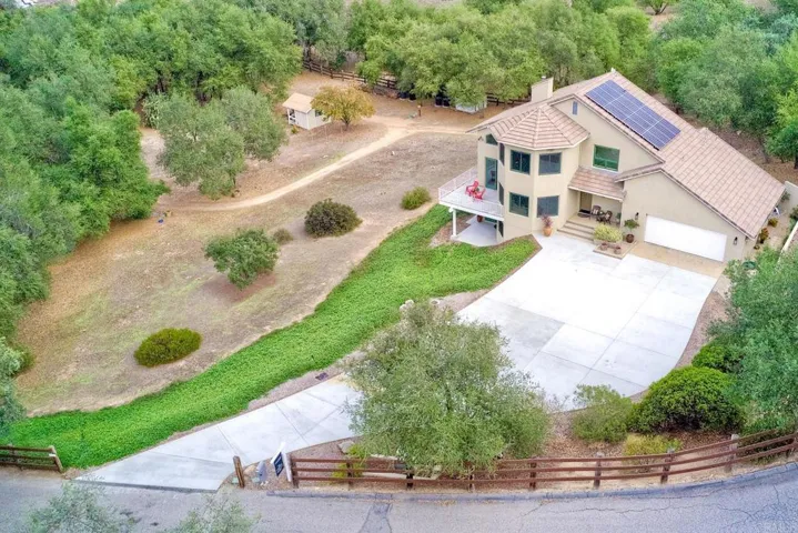 Welcome to this gorgeous custom built home & equestrian facility suitable for any discipline!